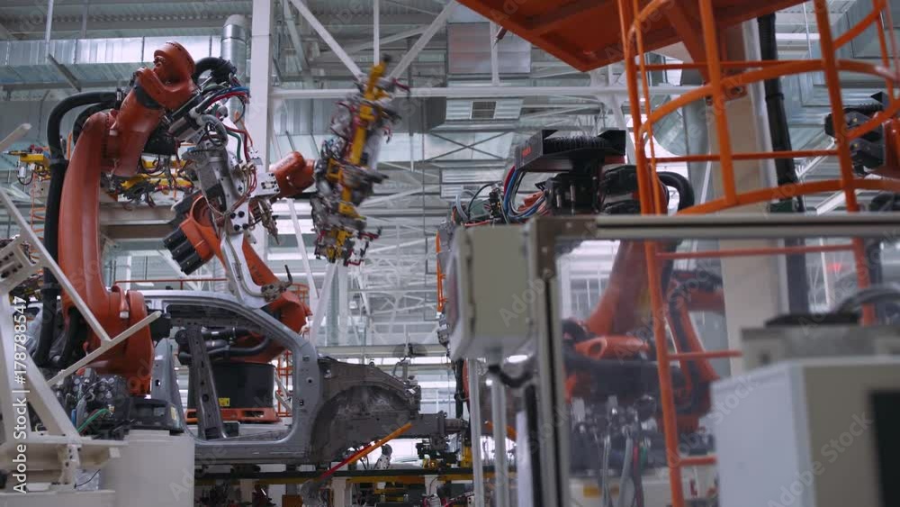 Automobile plant, robot equipment, welding process and assembly line of cars, modern production.
Automobile plant, robot equipment, welding process and assembly line of cars, modern production.