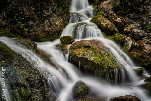 Myraf  lle waterfalls with huge mossy rocks