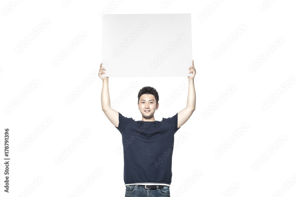 man hand hold a white empty board at the studio.