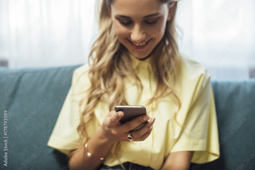Young Woman Typing on Cell Phone Young Woman Typing on Cell Phone
