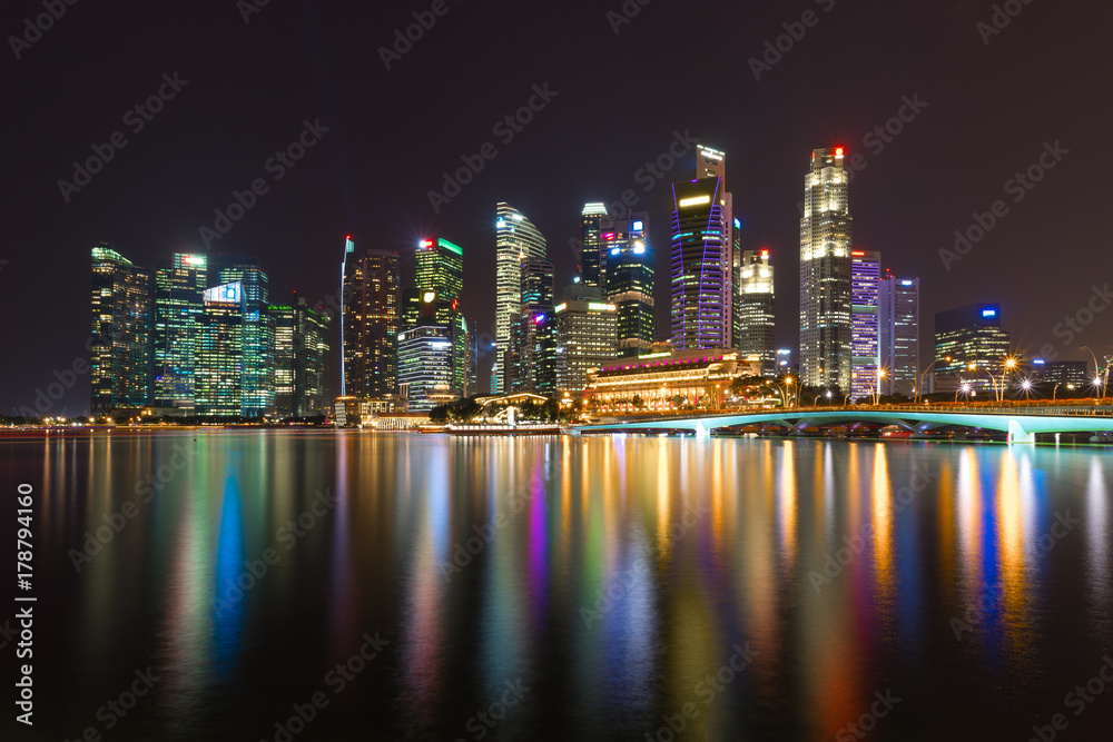 Singapore Marina Bay Cityscape. Skyscraper along Marina Bay at night time.