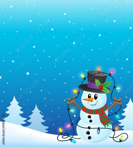 Snowman with Christmas lights image 4 © Klara Viskova