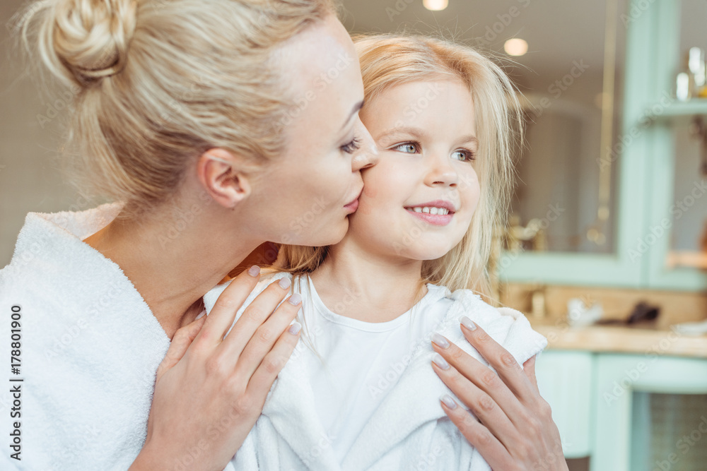 mother and daughter in bathrobes mother and daughter in bathrobes