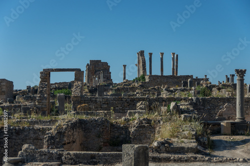 View of the Basilica and Capitoline Temple, archaeological Site of Volubilis, ancient Roman empire city, Unesco World Heritage Site, located in Morocco near Meknes