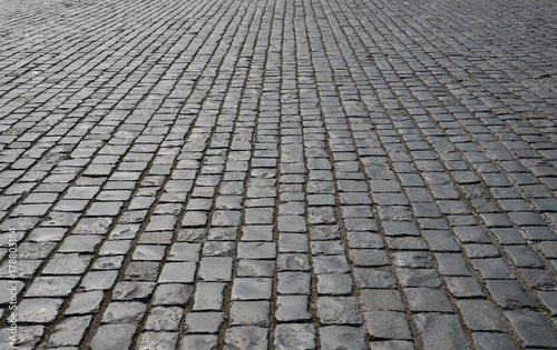 Old cobblestone pavement close-up. photo