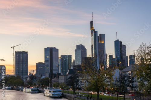 Lit Skyline of Frankfurt close up after sunset with beautiful sky