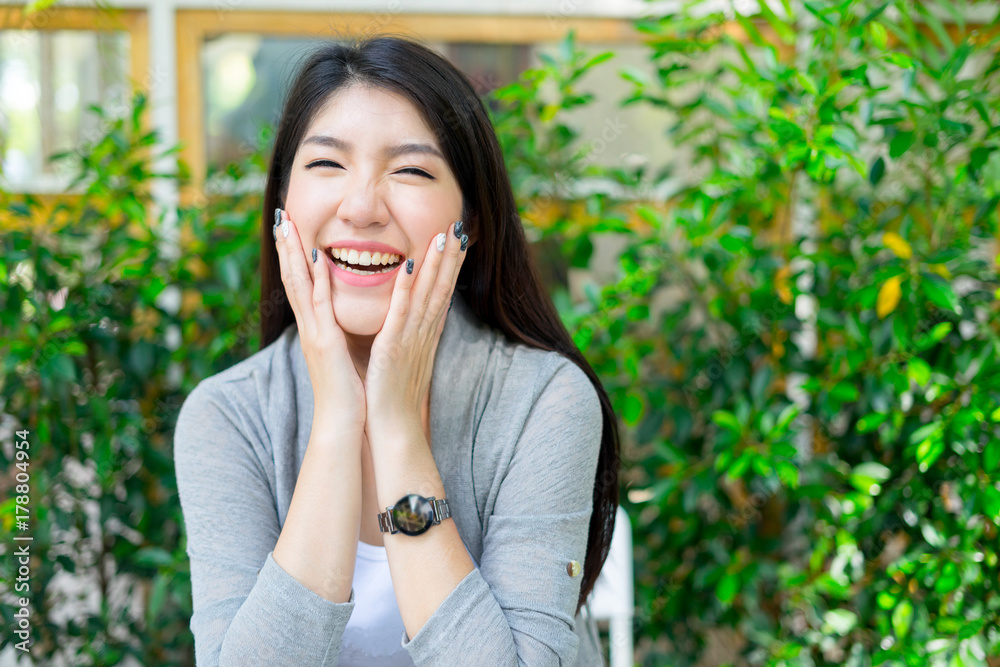 happy girl look at camera laughing and smiling in cafe happy girl look at camera laughing and smiling in cafe
