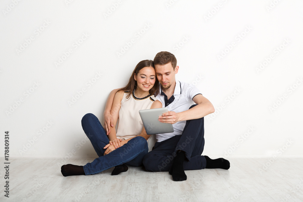 Couple shopping online with digital tablet Couple shopping online with digital tablet