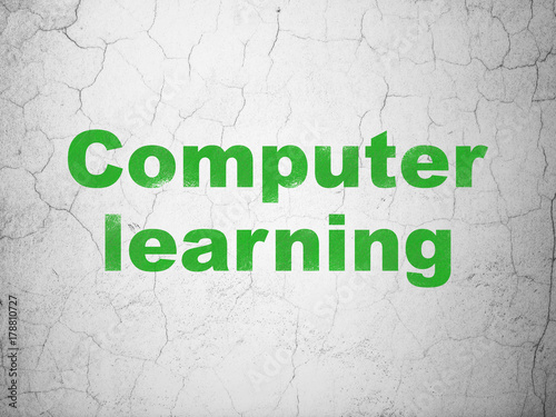 Studying concept: Green Computer Learning on textured concrete wall background