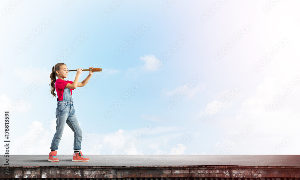 Concept of careless happy childhood with girl exploring this world Concept of careless happy childhood with girl exploring this world