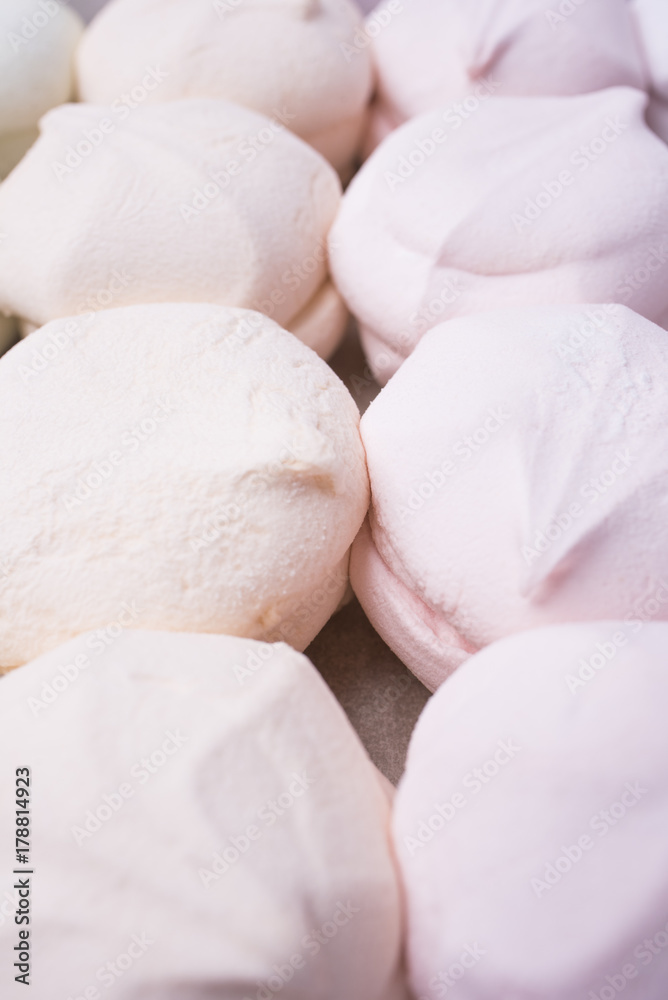Multicolored sweet marshmallows close-up, vertical frame Multicolored sweet marshmallows close-up, vertical frame