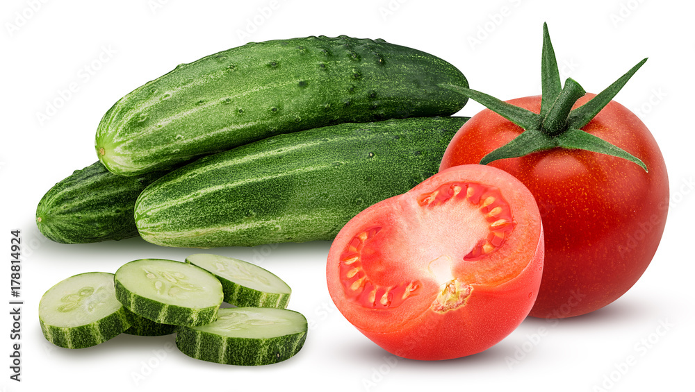 Three cucumber with chopped and whole tomato and one cut in half Three cucumber with chopped and whole tomato and one cut in half