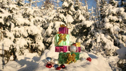 Christmas gifts in the snow-covered forest. New Year theme. © Довидович Михаил