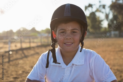 Boy smiling at camera in the ranch © WavebreakMediaMicro