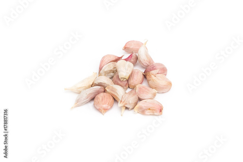 pile of fresh garlic on white background