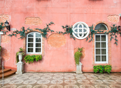 Canvas Print window on red wall in vintage style. Italy home style