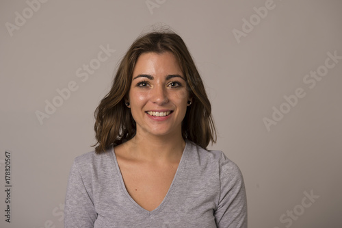 young attractive and beautiful woman smiling excited and happy showing positive and friendly face expression
