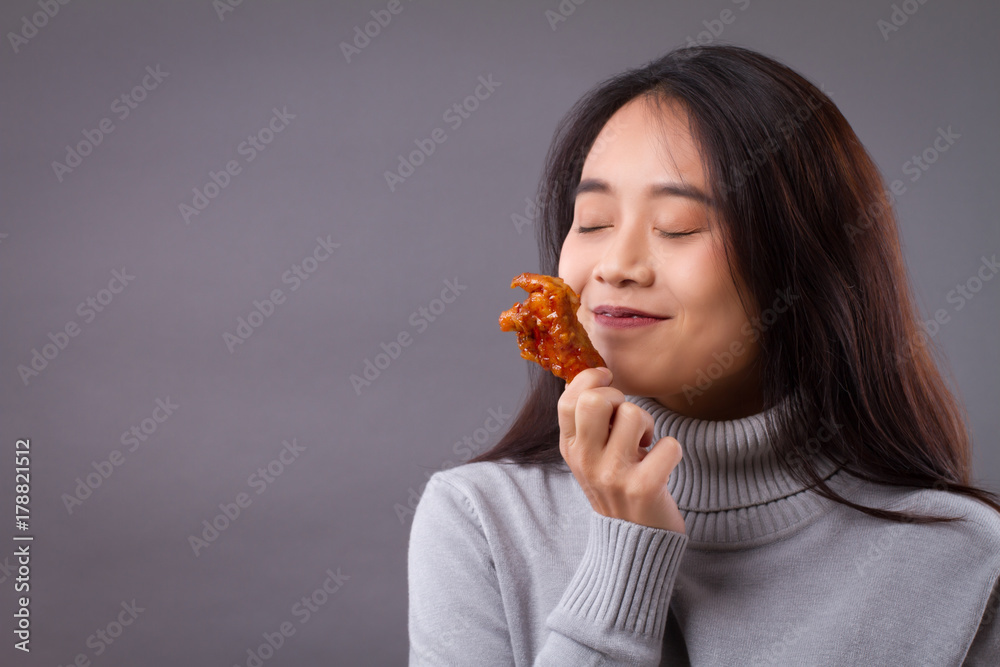 happy woman smelling fried chicken aroma