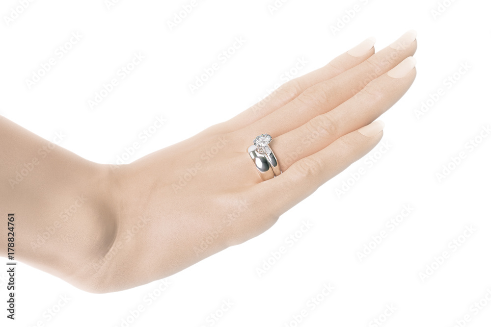 Woman's right hand with platin wedding ring Woman's right hand with platin wedding ring
