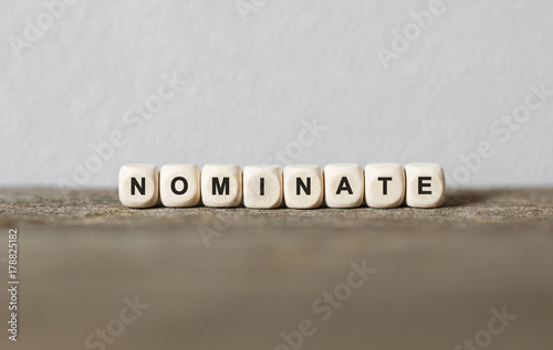 Cuadro en lienzo Word NOMINATE made with wood building blocks