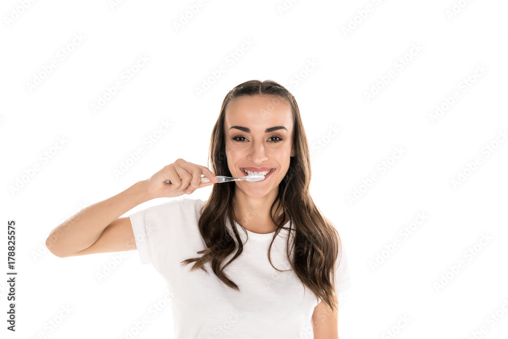woman brushing teeth