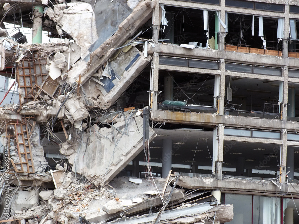 ruined old concrete building during demolition ruined old concrete building during demolition