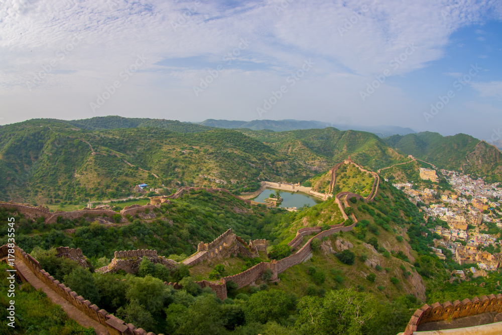 Beautiful view of the Amber fort in Rajasthan in Jaipur India with a stoned walls protecting the ancient indian palace, fish eye effect