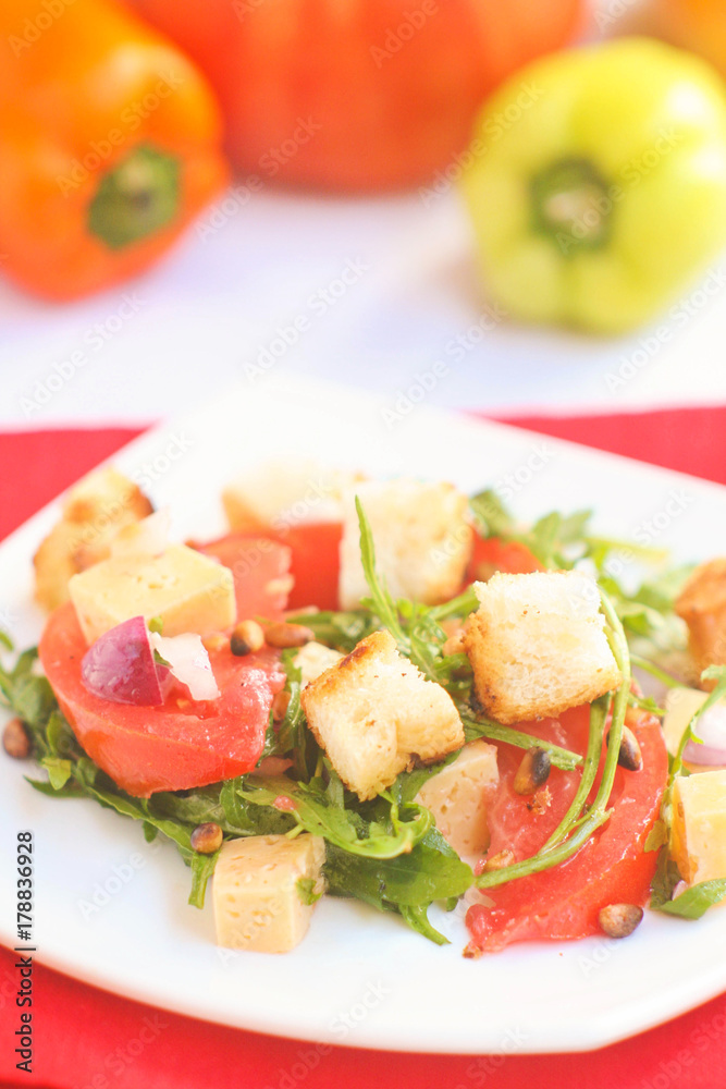 Salad with croutons, tomatoes and arugula Salad with croutons, tomatoes and arugula