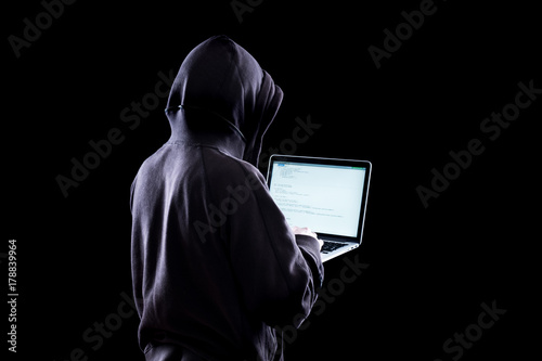 Anonymous hacker in the dark