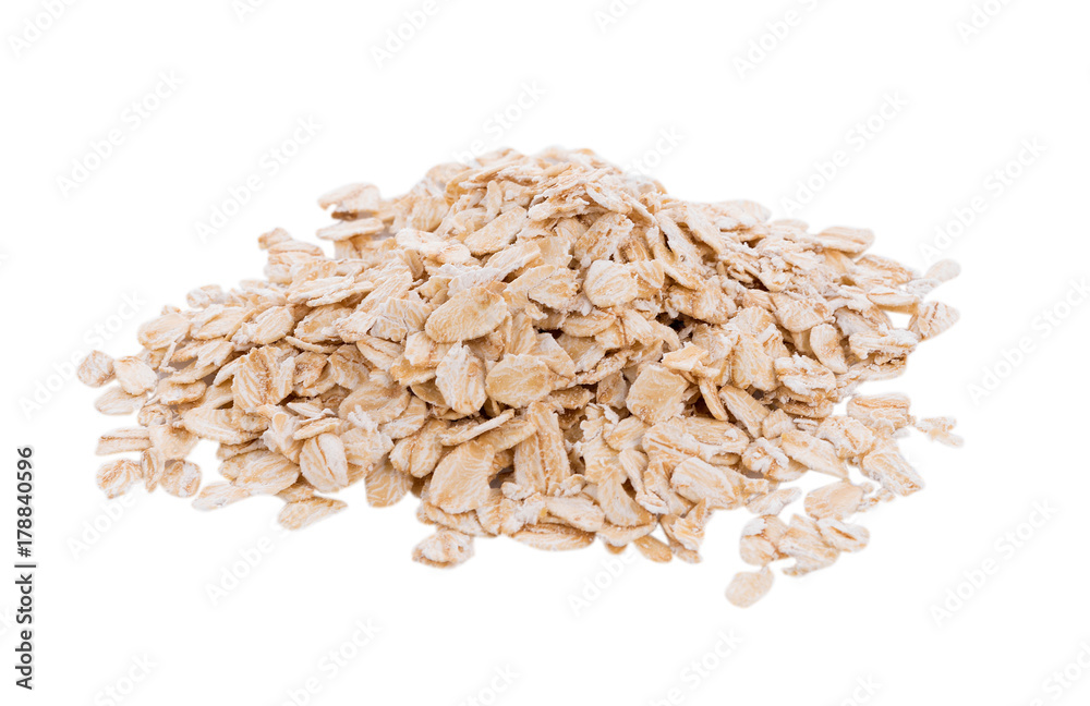 Oat flakes pile on white background Oat flakes pile on white background