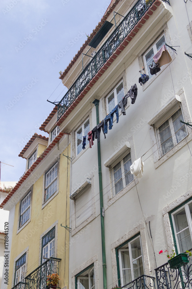 Clothes drying out of a building Clothes drying out of a building