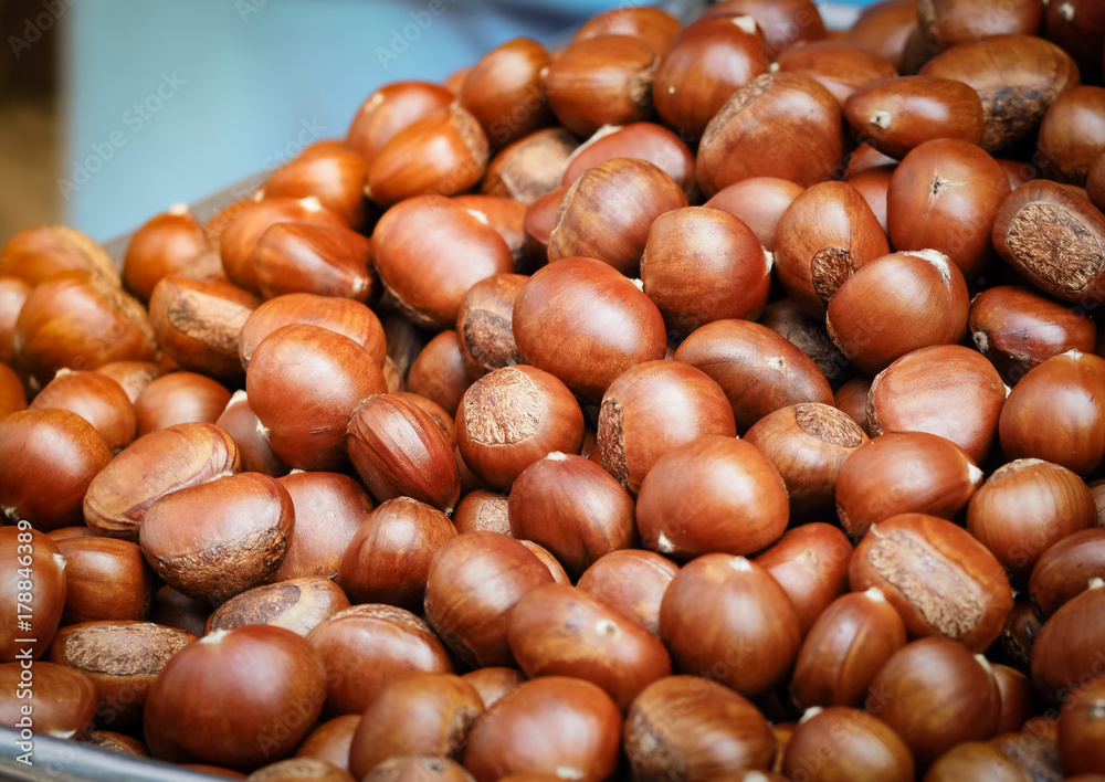 Chestnuts (Sterculia monosperma) roasting. Selective focus Chestnuts (Sterculia monosperma) roasting. Selective focus