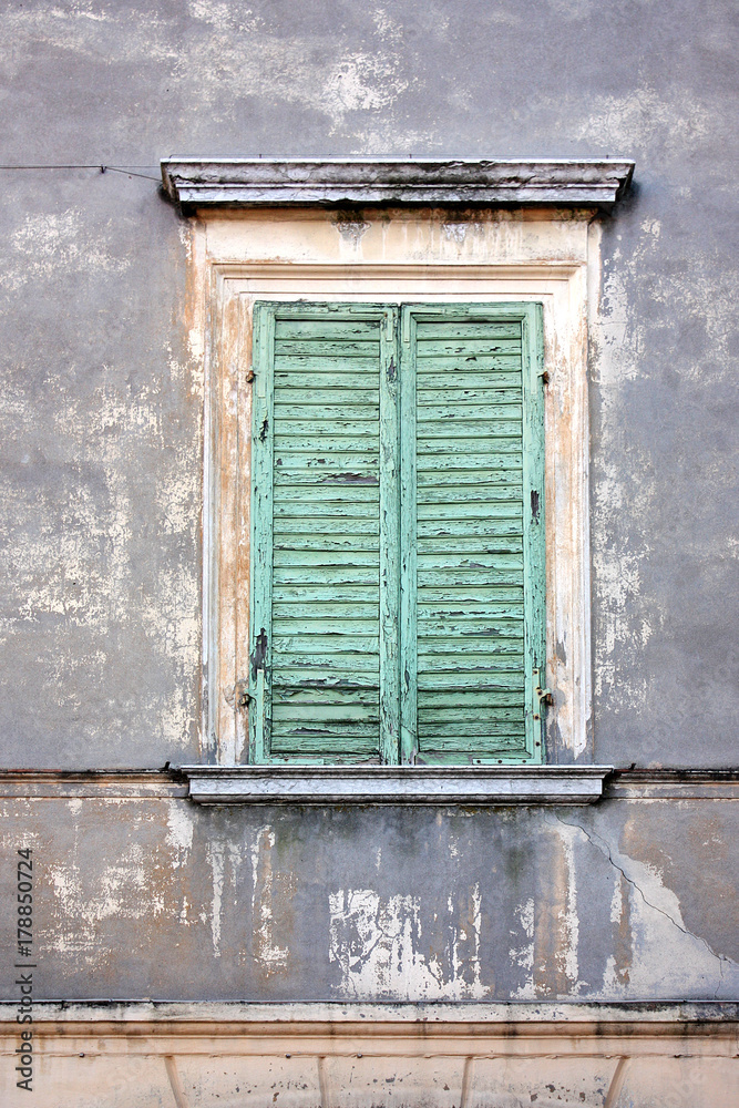 Building facade with window closed Building facade with window closed