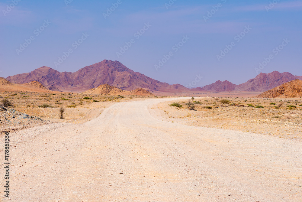 Road trip in the Namib desert, Namib Naukluft National Park, travel destination in Namibia. Travel adventures in Africa. Road trip in the Namib desert, Namib Naukluft National Park, travel destination in Namibia. Travel adventures in Africa.