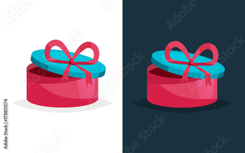 Festive gift in round box with colored pattern and ribbon.