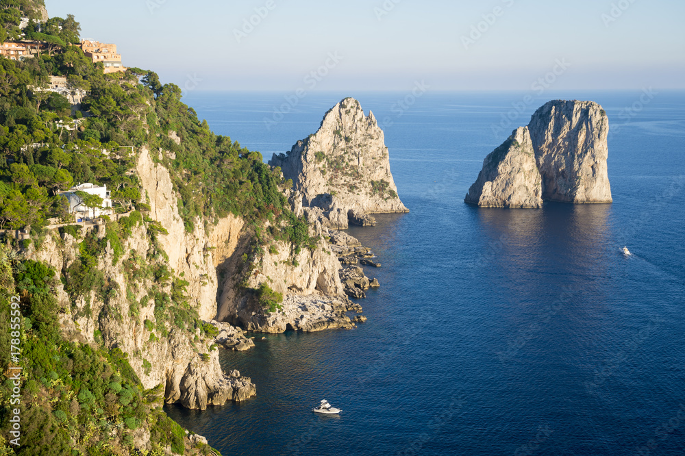 View of the iconic faraglioni rocks of Capri Island in Italy.