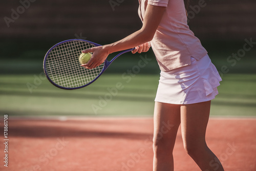 Girl playing tennis © georgerudy