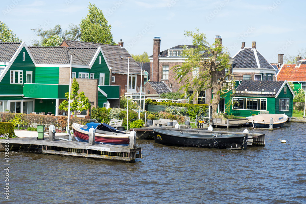 Houses on the channel in Zaandam, near Zaanse Schans,Netherlands Houses on the channel in Zaandam, near Zaanse Schans,Netherlands