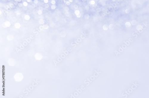 Soft violet or blue bokeh light is the soft blurred circles of light white and light purple