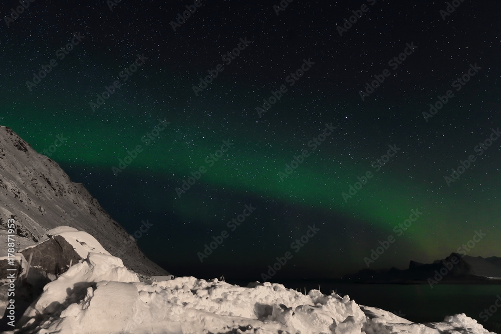 Aurora borealis-Polar lights-Northern lights over Ytresandheia-Roren mounts. Yttresand-Moskenesoya island-Lofoten-Norway. 0473