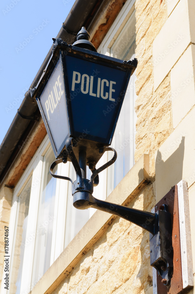 Blue Police lamp on the outside of an English Police Station Stock Photo |  Adobe Stock