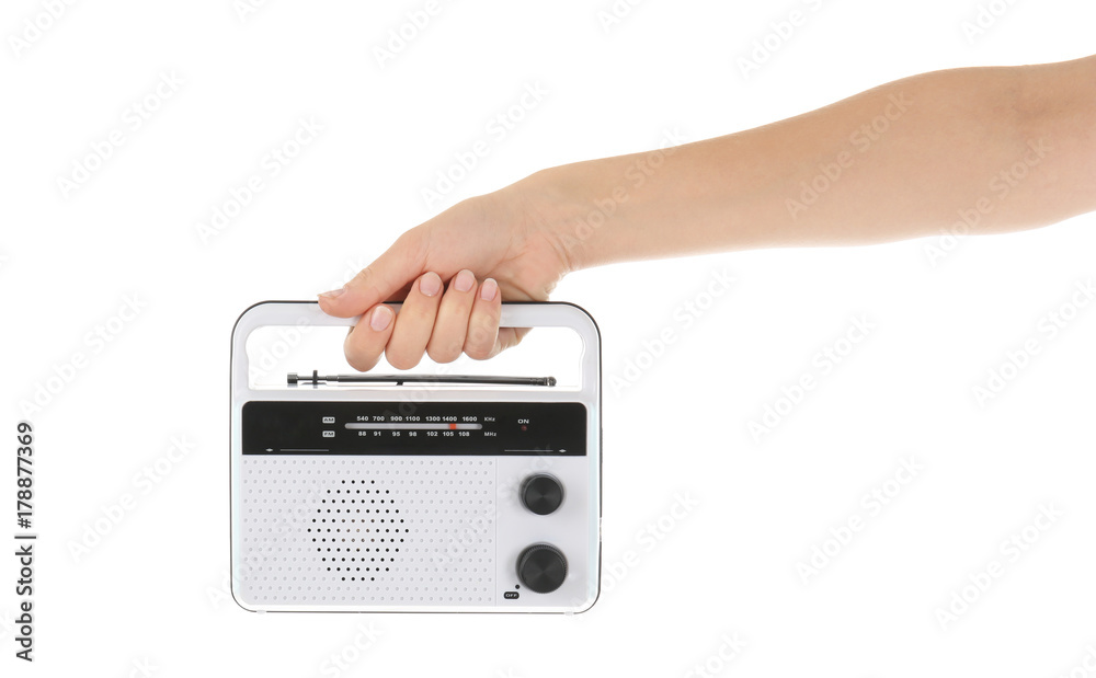 Fototapeta premium Woman holding radio on white background