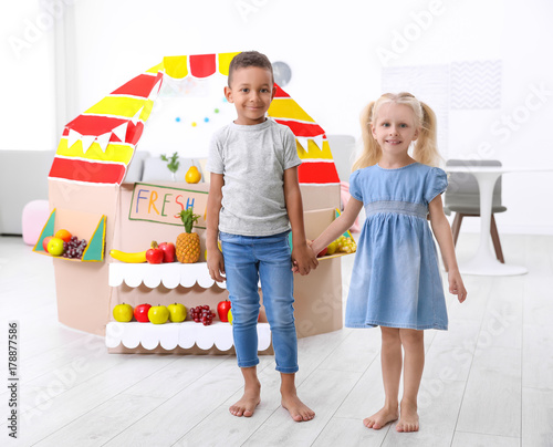 Cute kids standing near cou...