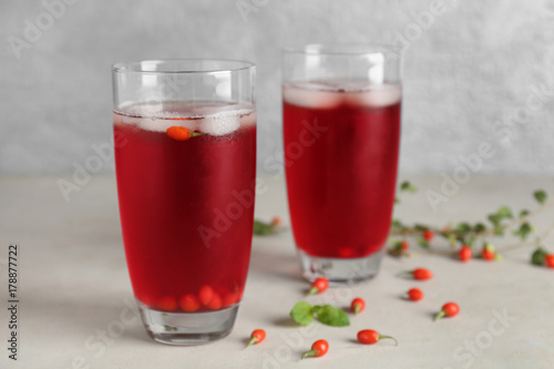 Glasses with goji juice on table