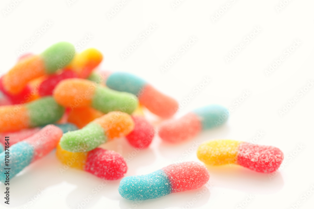 Colorful gummy jelly sugar candies close up isolated in white background Colorful gummy jelly sugar candies close up isolated in white background