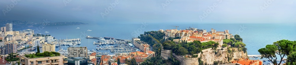 Panoramic view of Monaco coast at sunset in overcast day Panoramic view of Monaco coast at sunset in overcast day