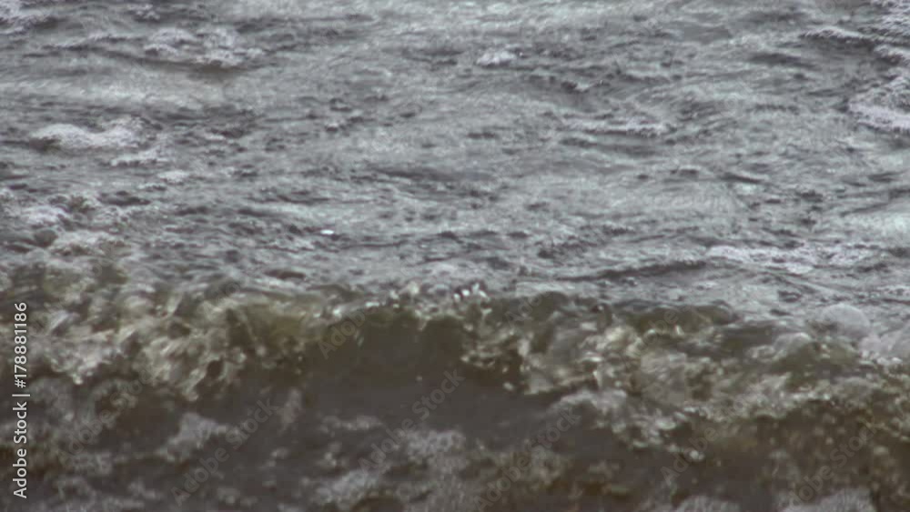 Sea wave engulfing shore. Elements of natural water. Ocean surf waves. Storm wild sea - dangerous weather. Sea wave engulfing shore. Elements of natural water. Ocean surf waves. Storm wild sea - dangerous weather.