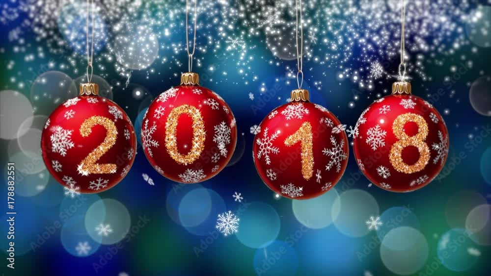 hanging 2018 number glitter Christmas balls on blue bokeh background. 4K