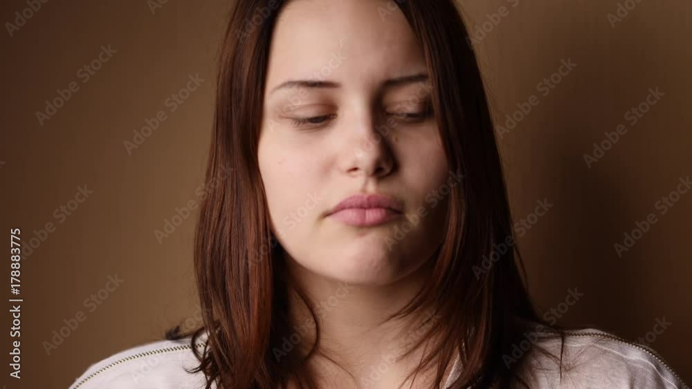 Surprised teen girl looking to a camera and making faces. Surprised teen girl looking to a camera and making faces.