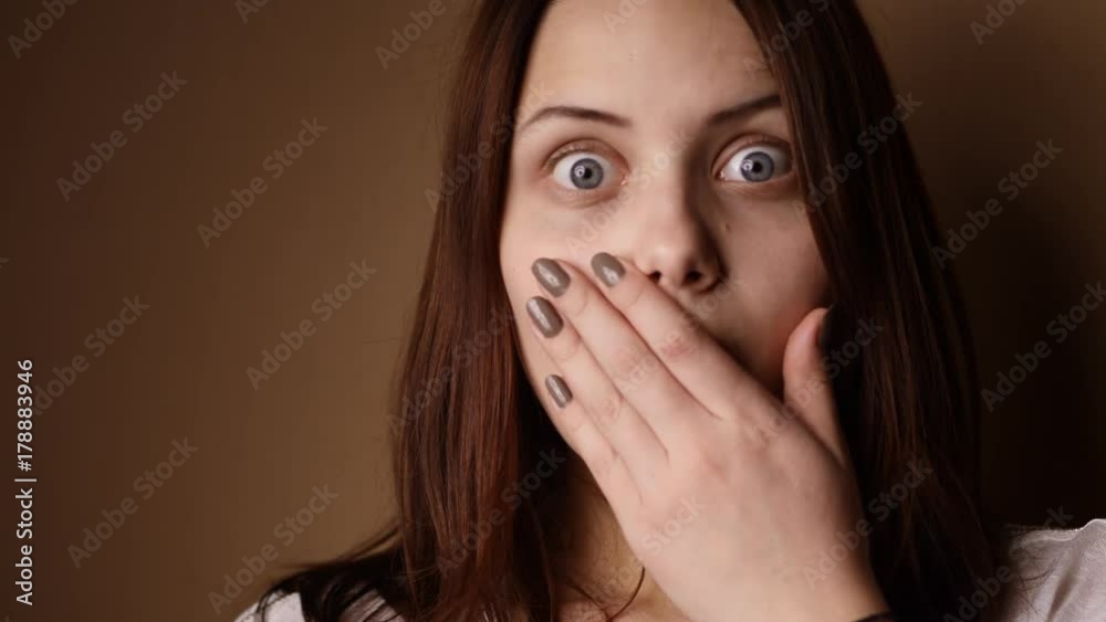 Surprised teen girl looking to a camera and making faces. Surprised teen girl looking to a camera and making faces.